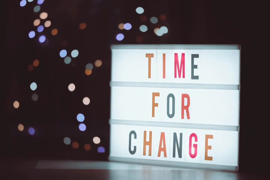 Time for change written on a white board